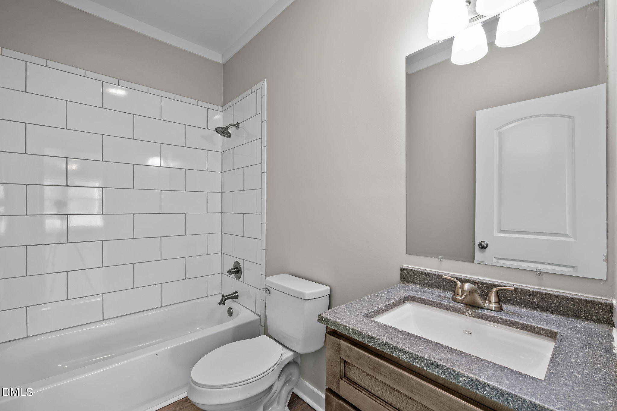 1108 Shelton Road Roxboro, NC 27573 - Photo 20 of 27 a bathroom with a granite countertop bathtub sink vanity mirror and toilet