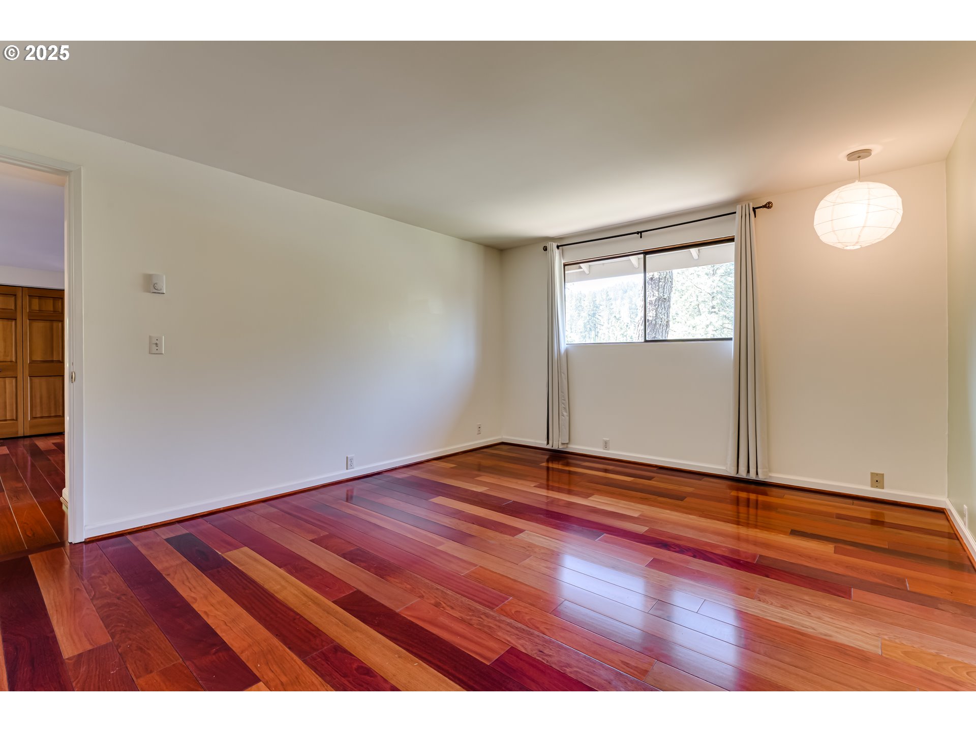 5140 Saratoga Street Eugene, OR 97405 - Photo 18 of 45 a view of empty room with wooden floor