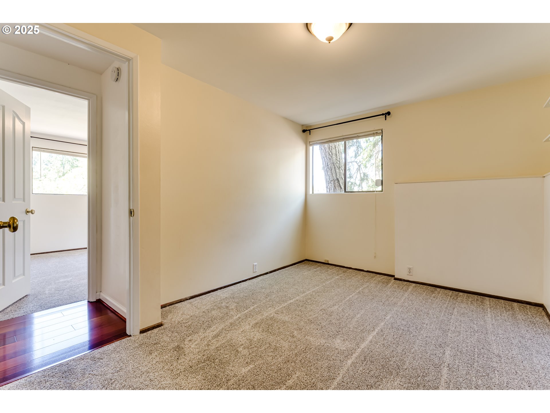 5140 Saratoga Street Eugene, OR 97405 - Photo 29 of 45 a view of an empty room and wooden floor