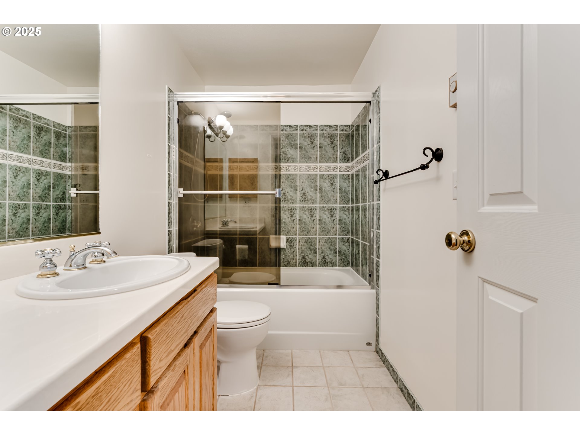 5140 Saratoga Street Eugene, OR 97405 - Photo 36 of 45 a bathroom with a sink a toilet a mirror and shower