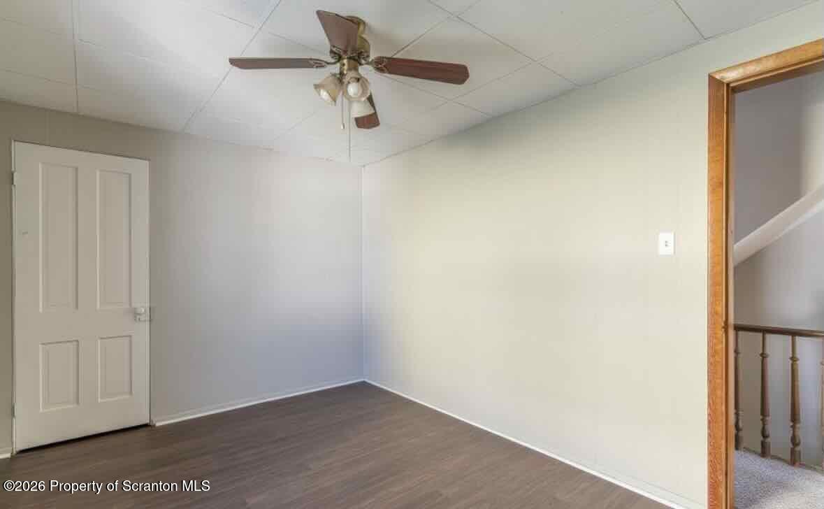 112 East Grove Street Taylor, PA 18517 - Photo 5 of 11 a view of a room with wooden floor