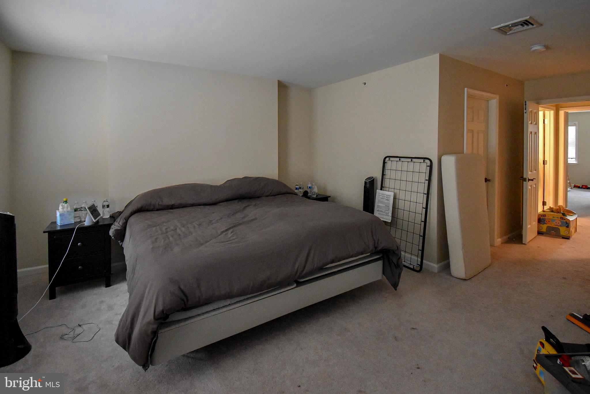 586 Wharton Boulevard Exton, PA 19341 - Photo 15 of 28 a bedroom with a bed and a closet