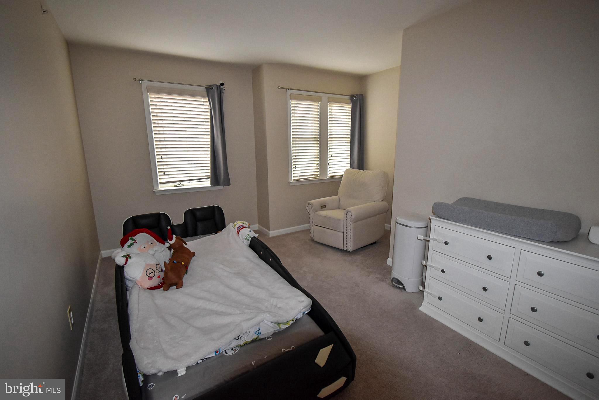 586 Wharton Boulevard Exton, PA 19341 - Photo 20 of 28 a bedroom with furniture and a window