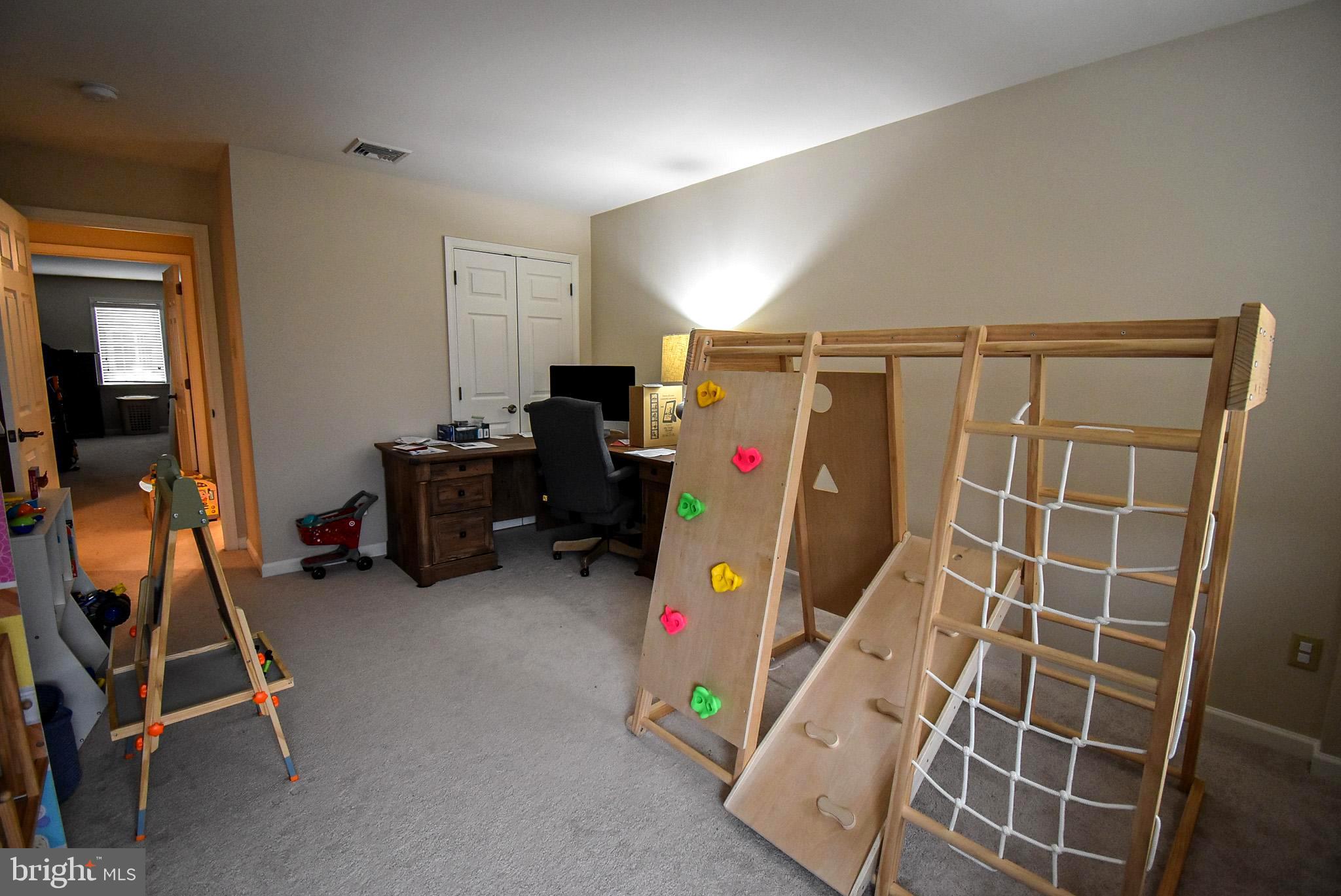 586 Wharton Boulevard Exton, PA 19341 - Photo 25 of 28 a view of a room with gym equipment