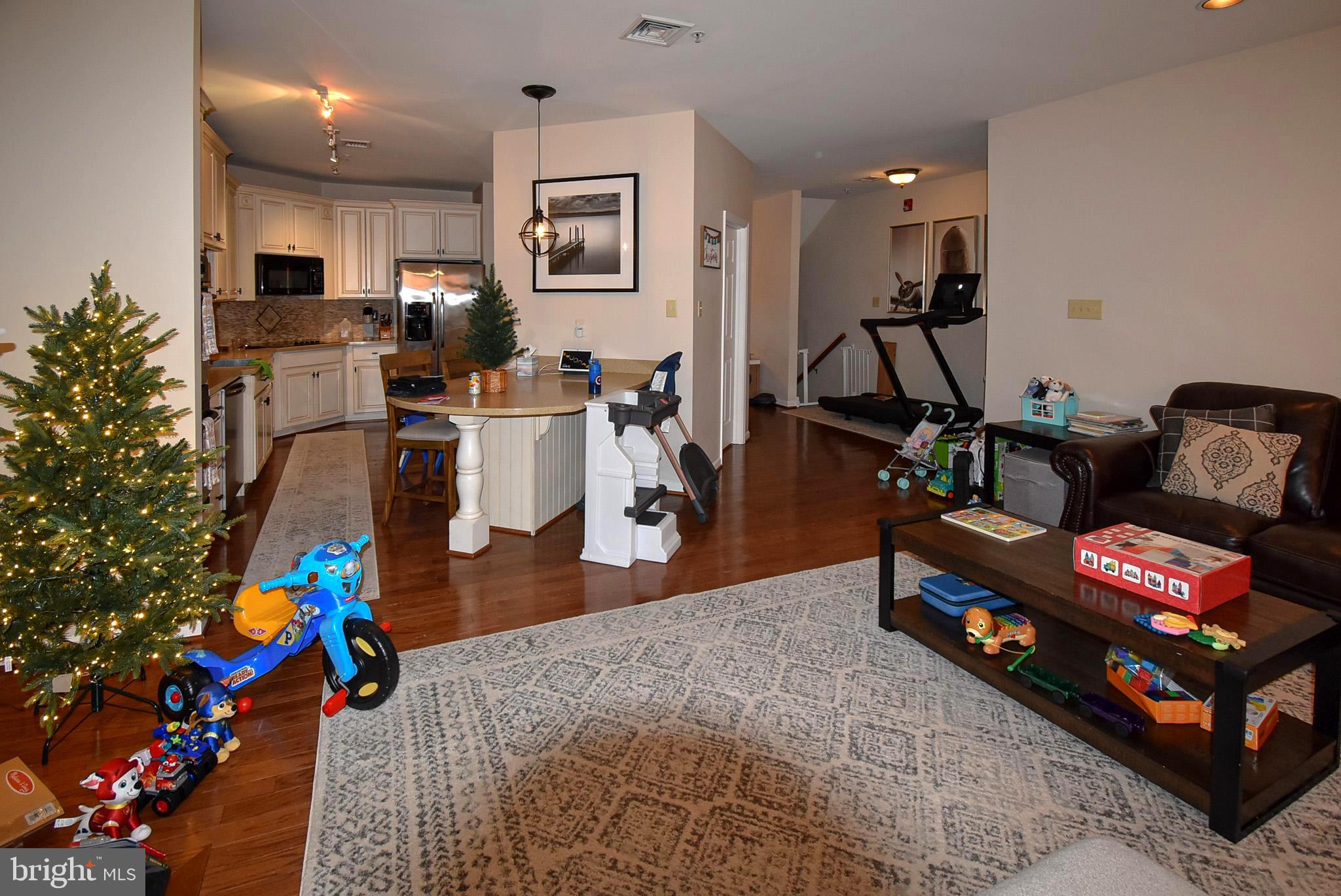 586 Wharton Boulevard Exton, PA 19341 - Photo 5 of 28 a living room with furniture and wooden floor