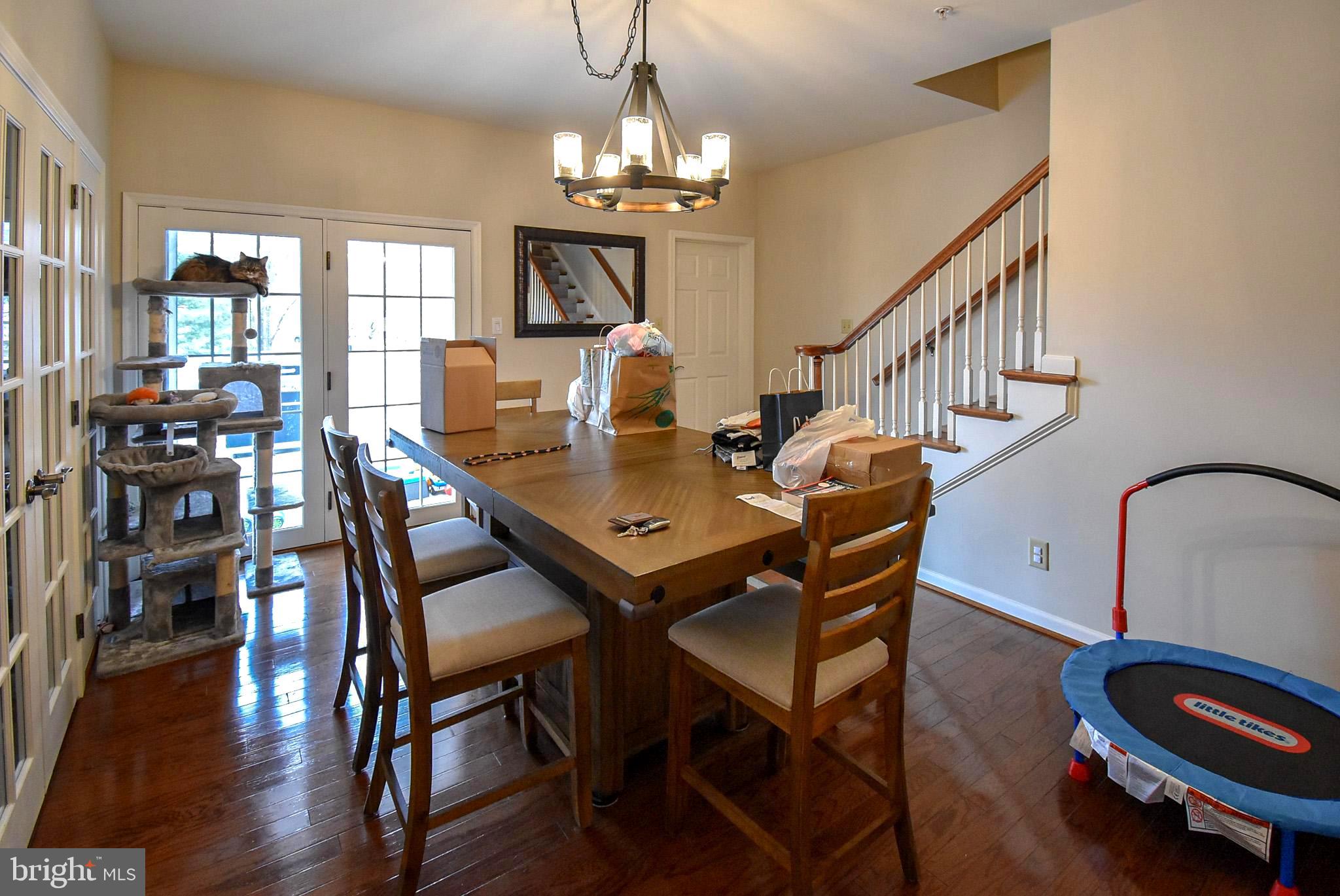 586 Wharton Boulevard Exton, PA 19341 - Photo 9 of 28 a view of a dining room with furniture and wooden floor