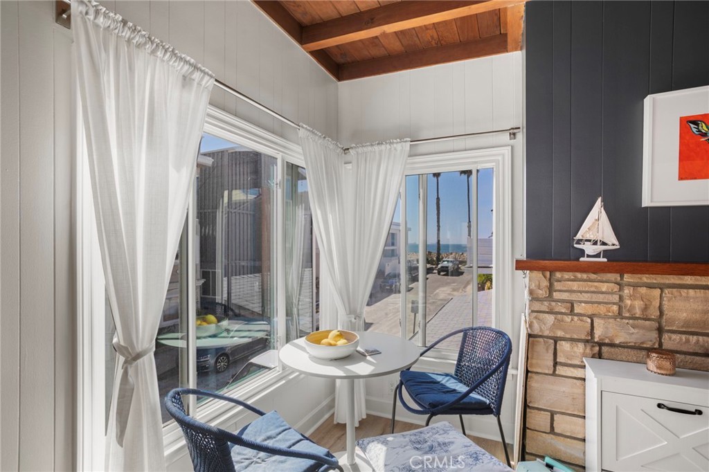 27 66th Place Long Beach, CA 90803 - Photo 26 of 56 a view of a dining room with furniture and window