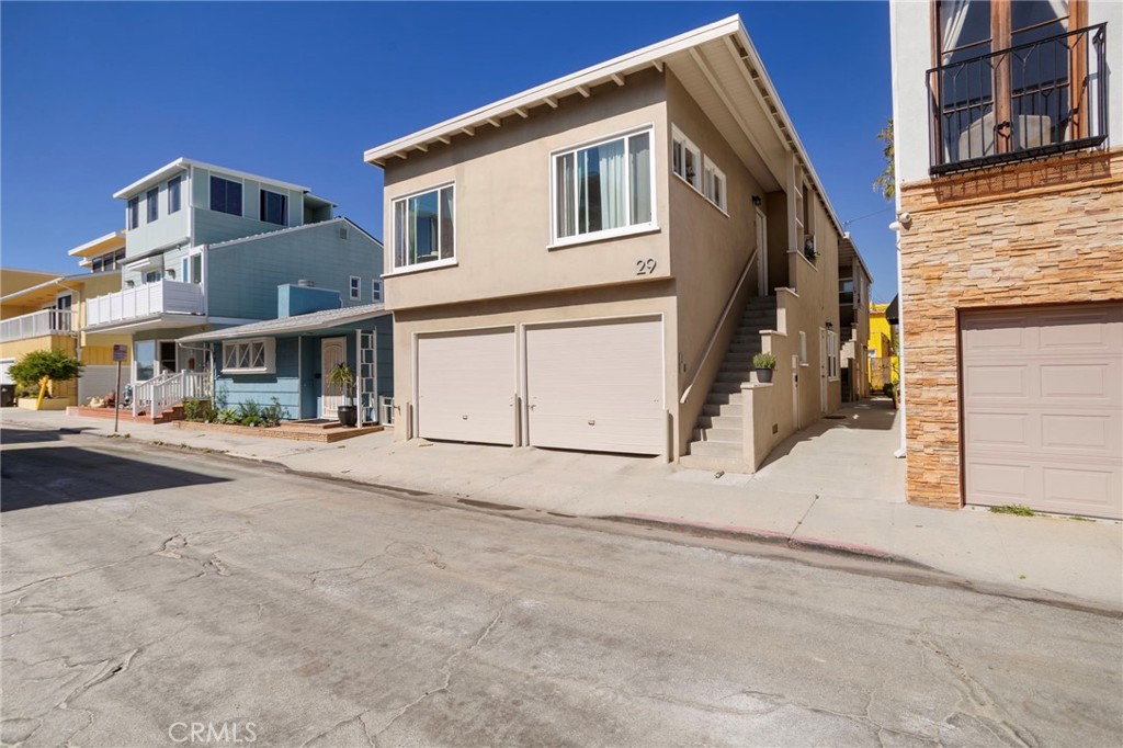 27 66th Place Long Beach, CA 90803 - Photo 4 of 56 a view of a building with a street