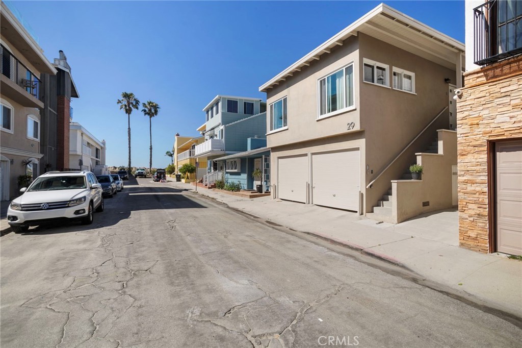 27 66th Place Long Beach, CA 90803 - Photo 5 of 56 a cars parked in front of a house