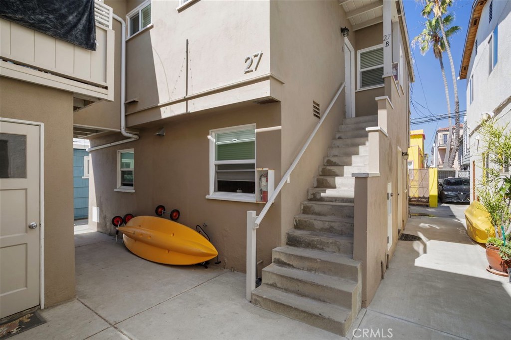 27 66th Place Long Beach, CA 90803 - Photo 7 of 56 a view of a livingroom with furniture and staircase