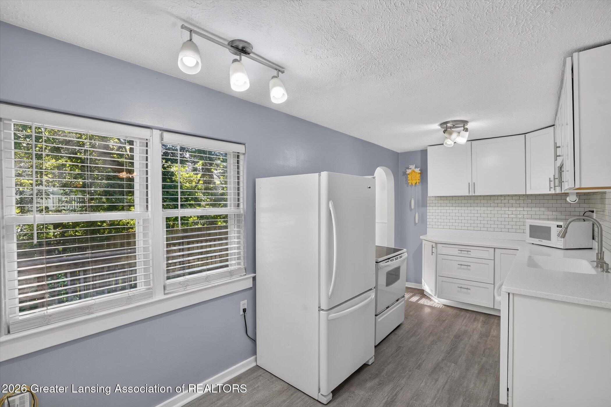 2020 Hamilton Road Okemos, MI 48864 - Photo 12 of 38 13-2020-Hamilton-Rd-WindowStill-Photogra