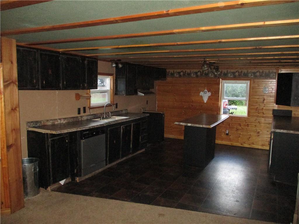 920 McCreight Road Shelocta, PA 15774 - Photo 21 of 25 a kitchen with stainless steel appliances kitchen island granite countertop a stove a sink and a microwave