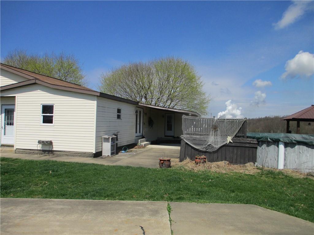 920 McCreight Road Shelocta, PA 15774 - Photo 10 of 25 a view of a backyard with plants and a large tree