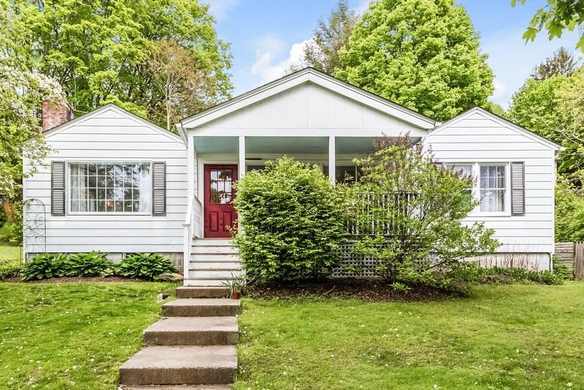 51 Fordyce Road New Milford, CT 06776 - Photo 1 of 1 a front view of a house with a garden