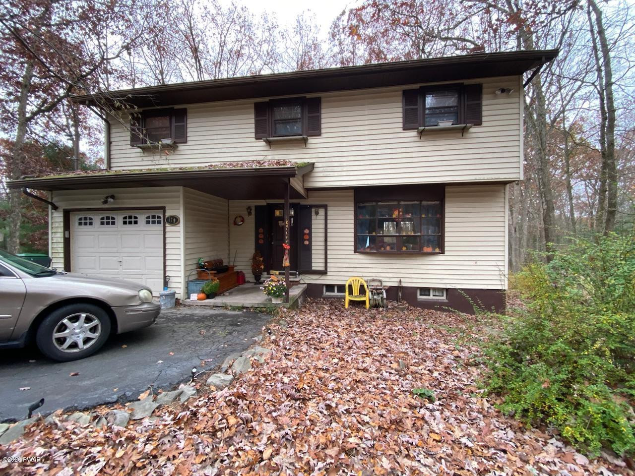 179 Butternut Road Milford, PA 18337 - Photo 1 of 39 a front view of a house with parking space