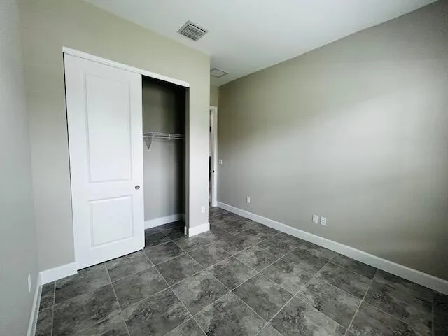 an empty room with closet