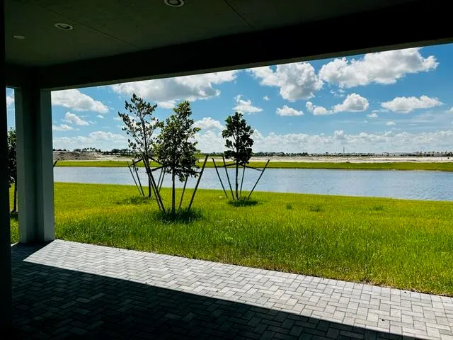 a view of swimming pool from a yard