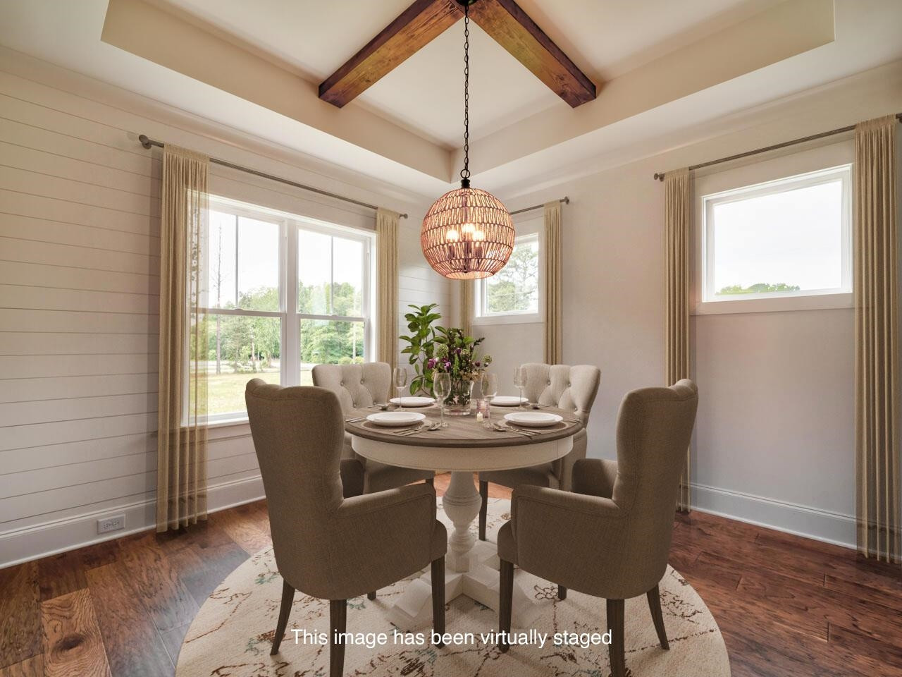 16 Constitution Avenue Smithfield, NC 27577 - Photo 20 of 60 a dining room with furniture a chandelier and wooden floor