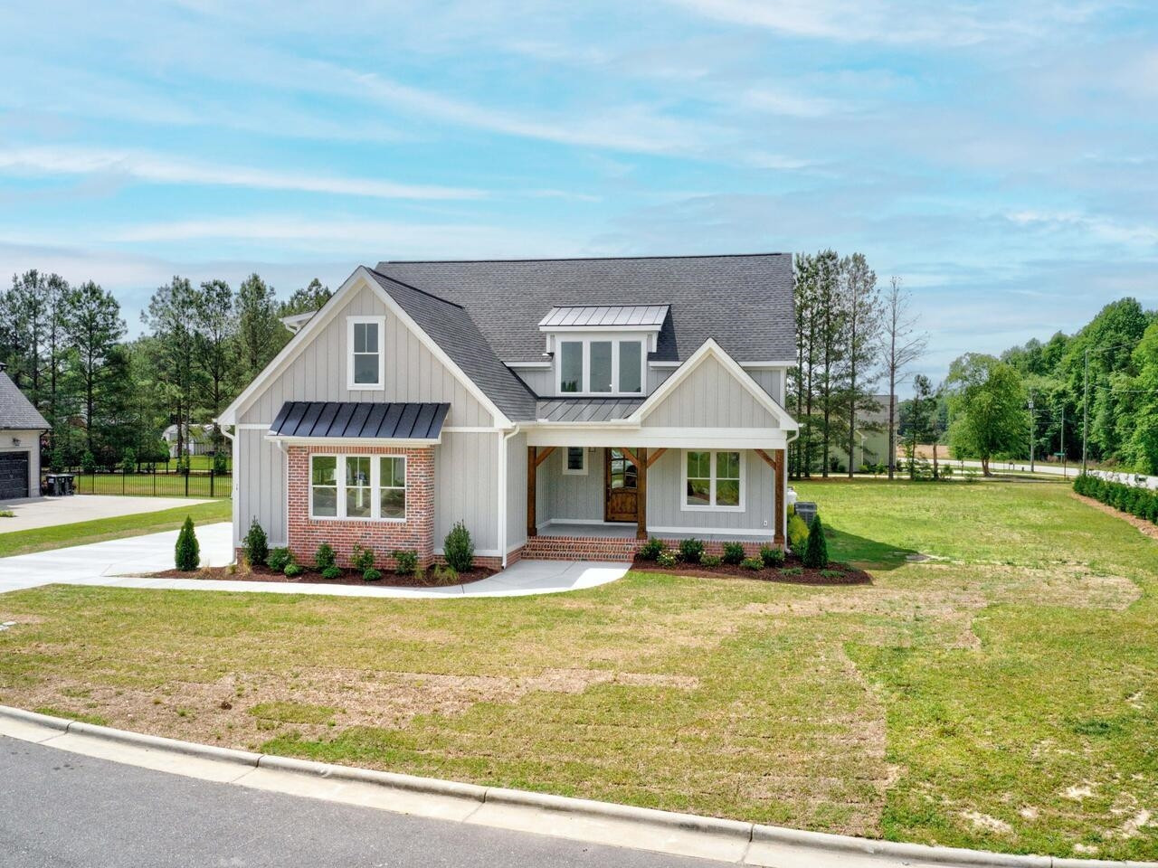 16 Constitution Avenue Smithfield, NC 27577 - Photo 2 of 60 a front view of house with yard and green space