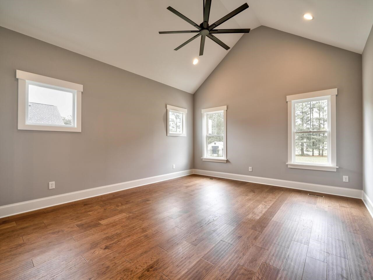 16 Constitution Avenue Smithfield, NC 27577 - Photo 27 of 60 a view of an empty room with wooden floor and a window