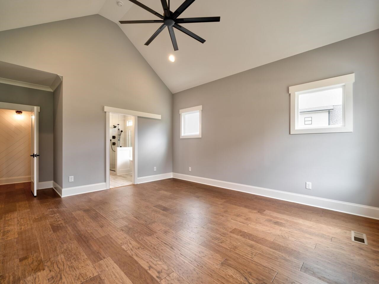 16 Constitution Avenue Smithfield, NC 27577 - Photo 28 of 60 a view of an empty room with window and wooden floor