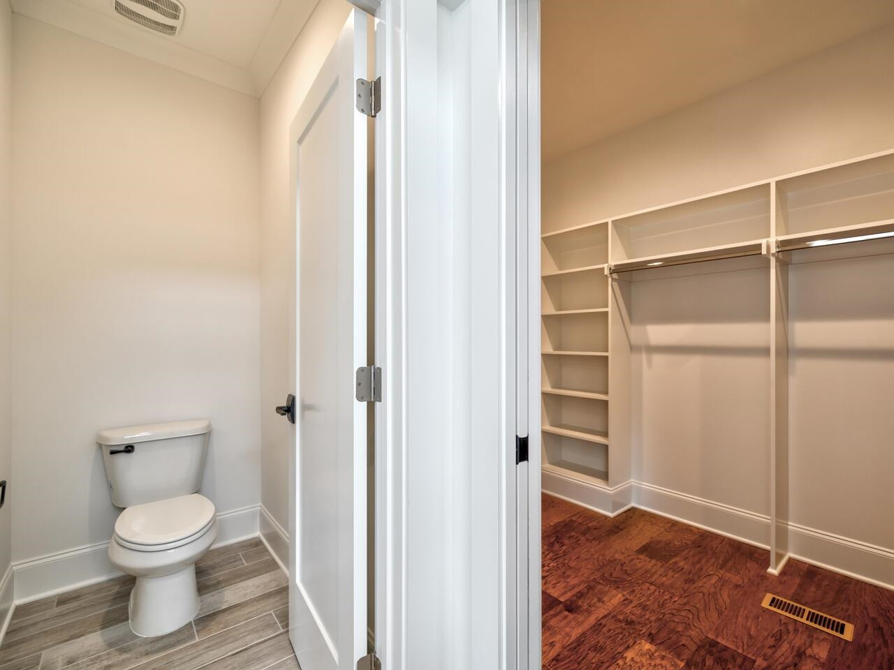 16 Constitution Avenue Smithfield, NC 27577 - Photo 32 of 60 a bathroom with a toilet and a shower