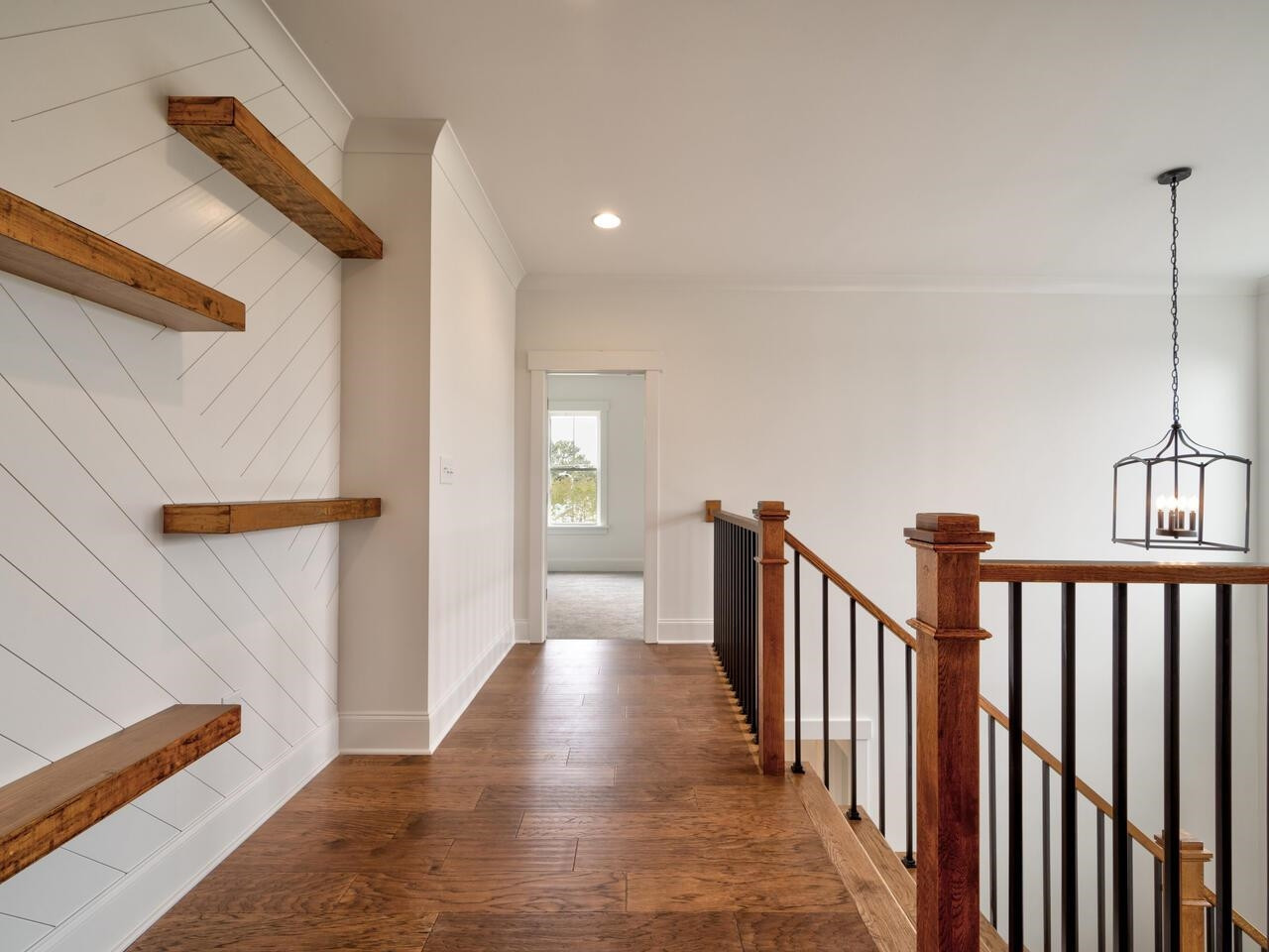 16 Constitution Avenue Smithfield, NC 27577 - Photo 35 of 60 a view of a hallway with wooden floor and entryway
