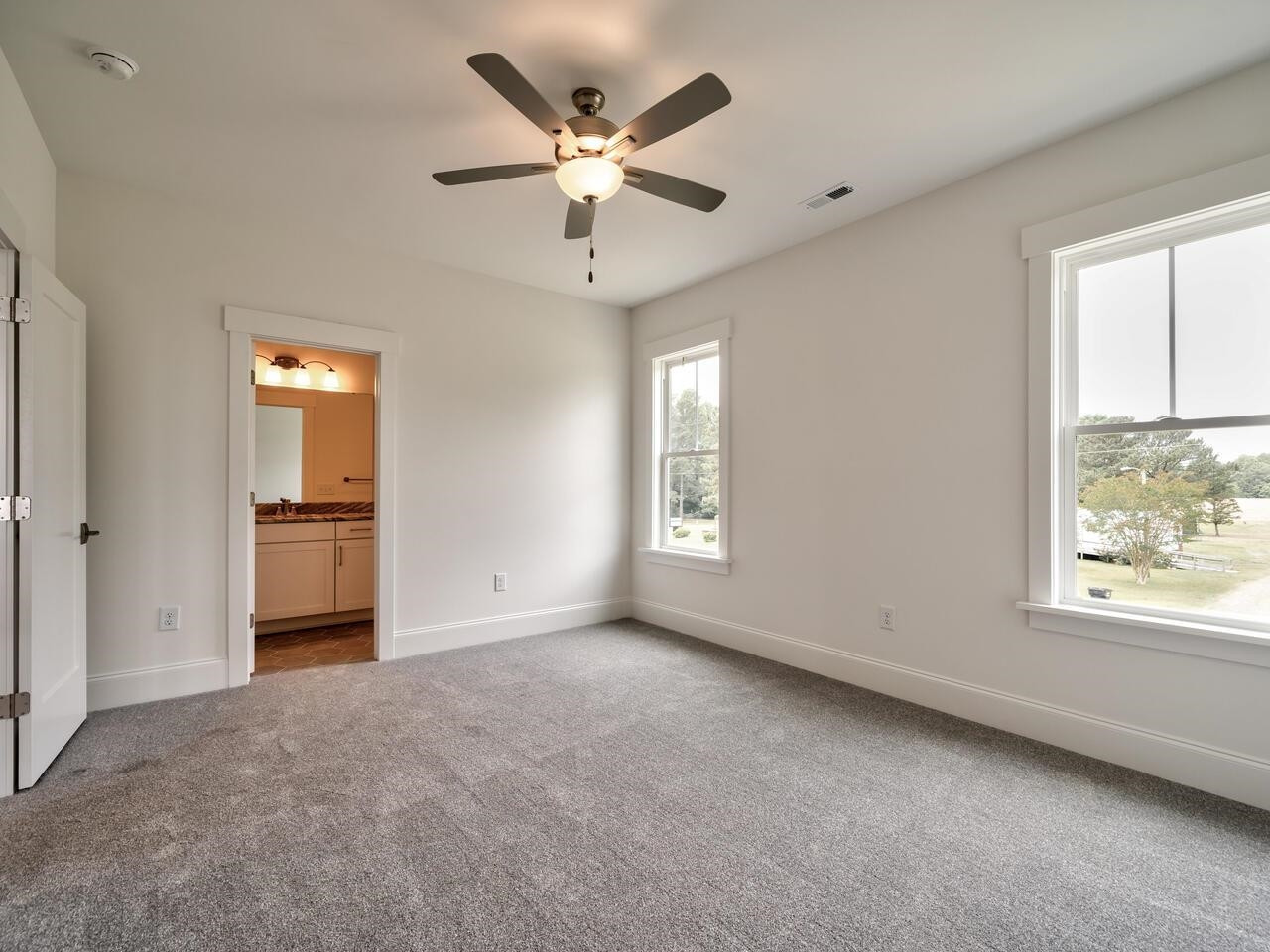 16 Constitution Avenue Smithfield, NC 27577 - Photo 40 of 60 a view of an empty room with a window