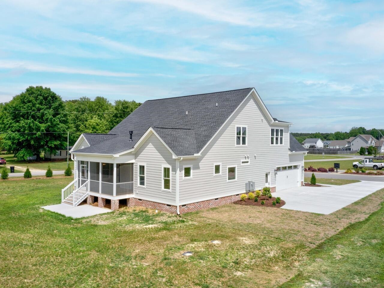 16 Constitution Avenue Smithfield, NC 27577 - Photo 57 of 60 a view of a house with a yard patio and swimming pool