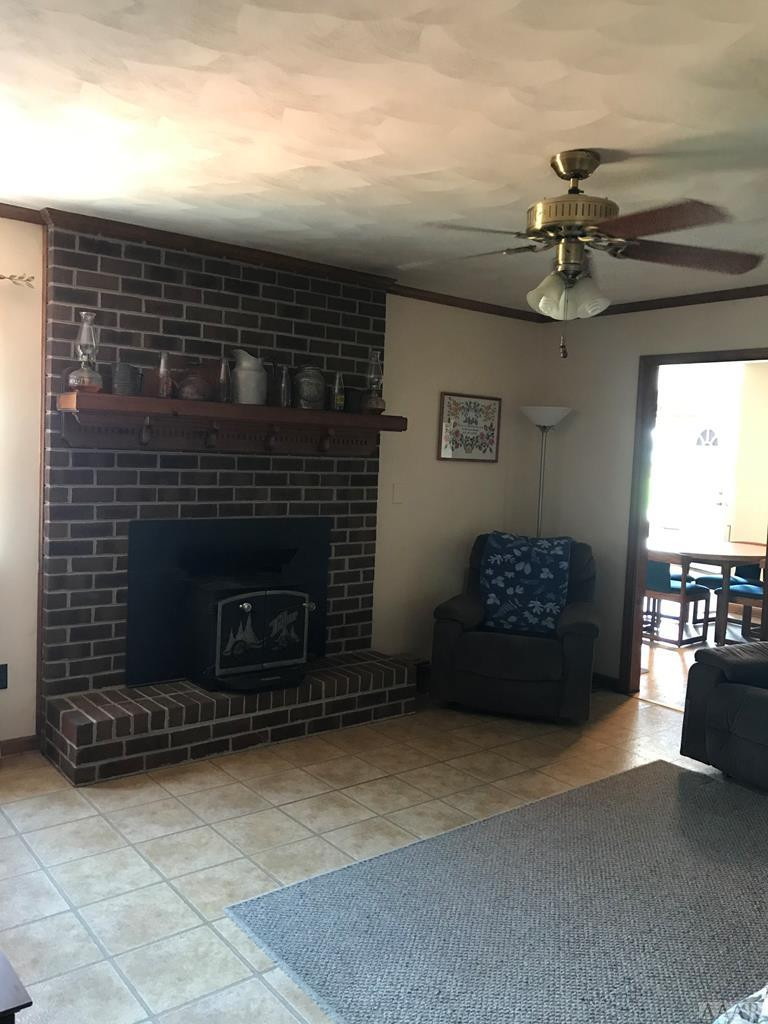 112 Quail Run Road Moyock, NC 27958 - Photo 23 of 43 Brick FP with mantle & wood stove insert