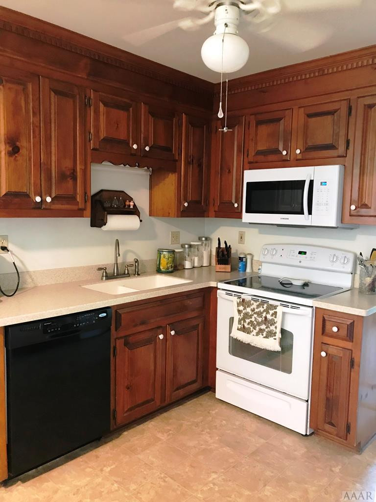 112 Quail Run Road Moyock, NC 27958 - Photo 30 of 43 Kitchen has solid surface countertops
