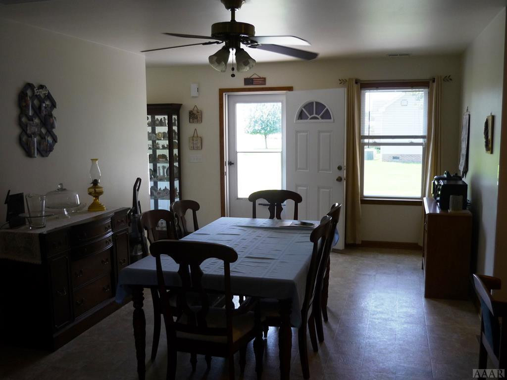 112 Quail Run Road Moyock, NC 27958 - Photo 32 of 43 Dining Area - door to driveway