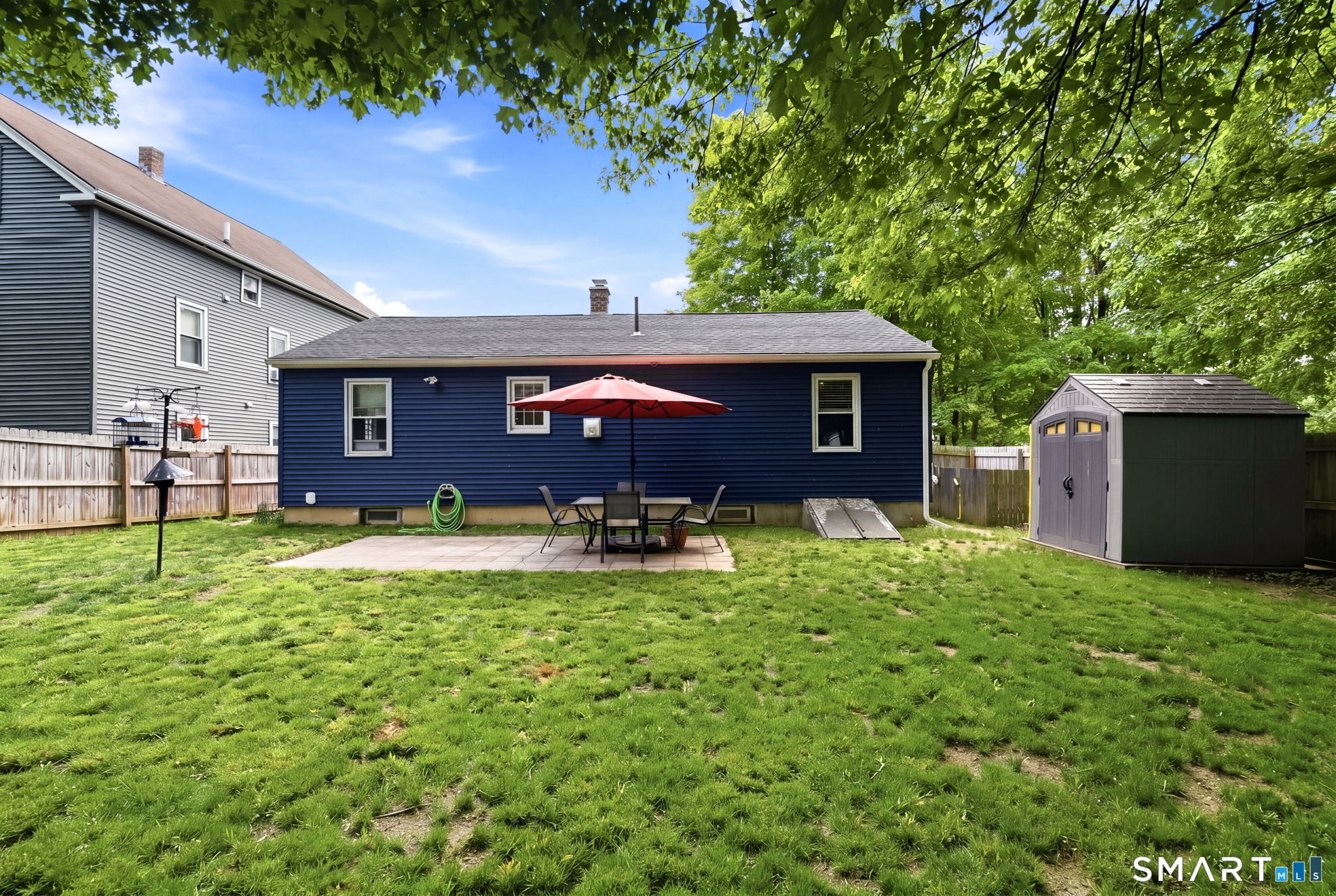 71 Smith Street Putnam, CT 06260 - Photo 20 of 25 a view of a house with a yard