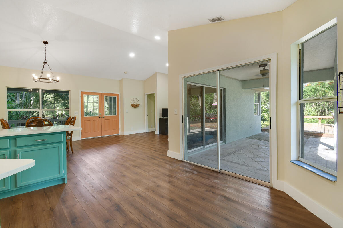12792 Old Indiantown Road Jupiter, FL 33478 - Photo 13 of 60 FAMILYROOM OPEN TO PATIO