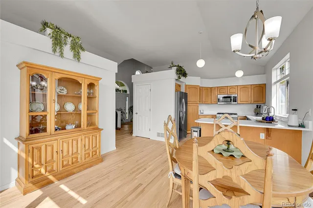 a bedroom with two beds and a window