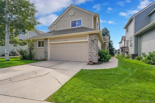 a front view of a house having yard