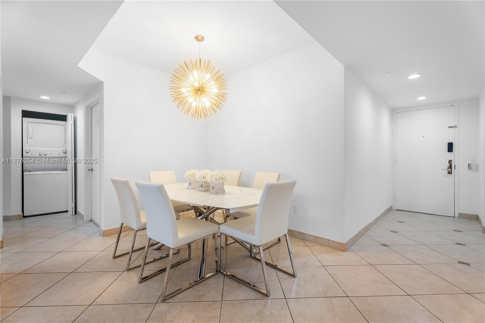 4779 Collins Avenue, Unit 1008 Miami Beach, FL 33140 - Photo 14 of 36 a view of a dining room with furniture