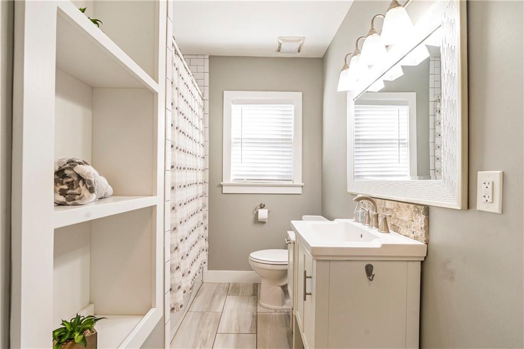 1403 Lavista Road Northeast Atlanta, GA 30324 - Photo 21 of 43 a bathroom with a sink toilet and tub