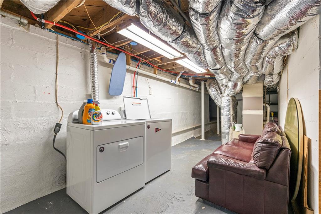 1403 Lavista Road Northeast Atlanta, GA 30324 - Photo 32 of 43 a utility room with dryer and washer
