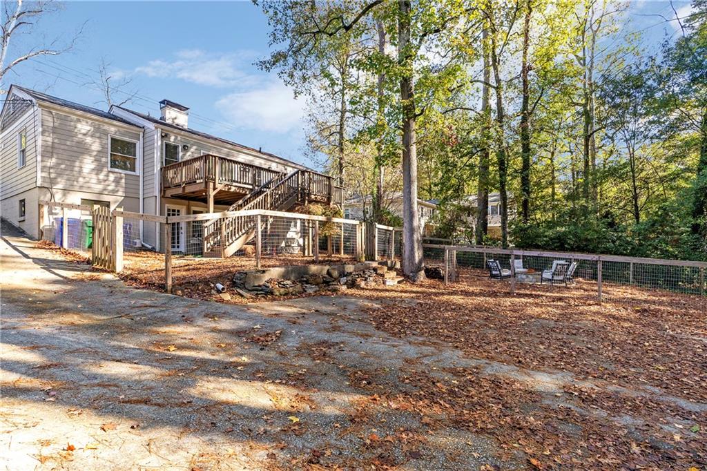 1403 Lavista Road Northeast Atlanta, GA 30324 - Photo 42 of 43 a backyard of a house with table and chairs