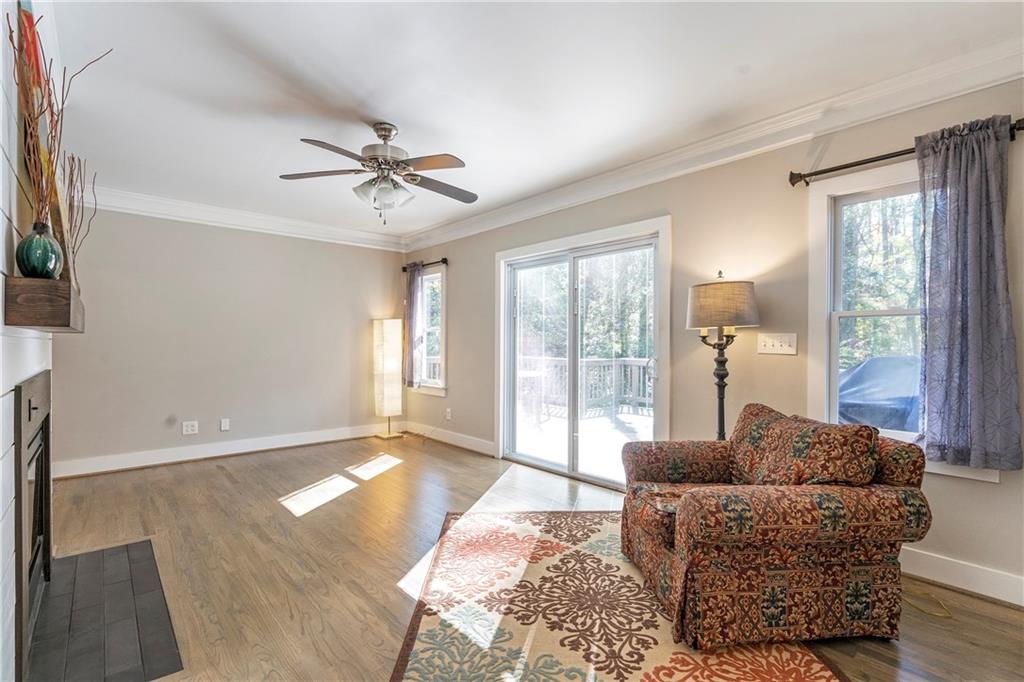 1403 Lavista Road Northeast Atlanta, GA 30324 - Photo 5 of 43 a living room with furniture and a large window