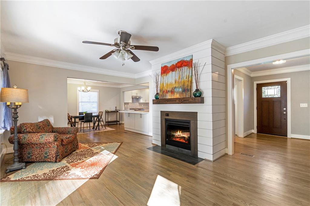 1403 Lavista Road Northeast Atlanta, GA 30324 - Photo 6 of 43 a living room with furniture and a fireplace