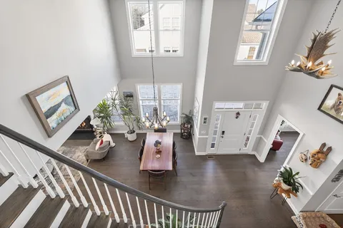 a view of a living room and dining room