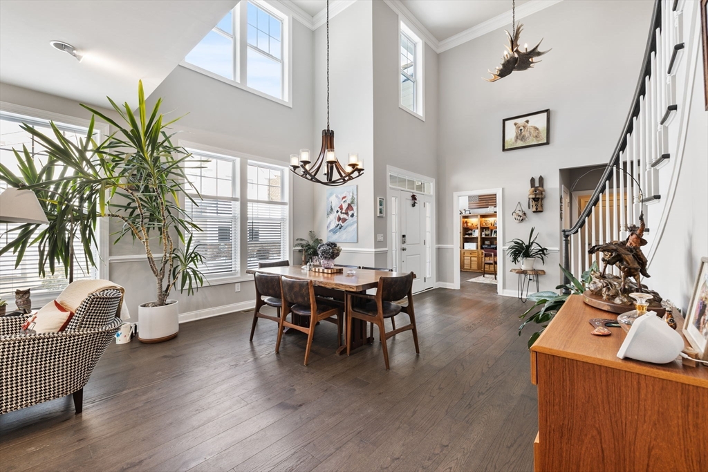 55 Phoebe Street, Unit 32 Methuen, MA 01844 - Photo 4 of 42 a dining room with furniture and wooden floor