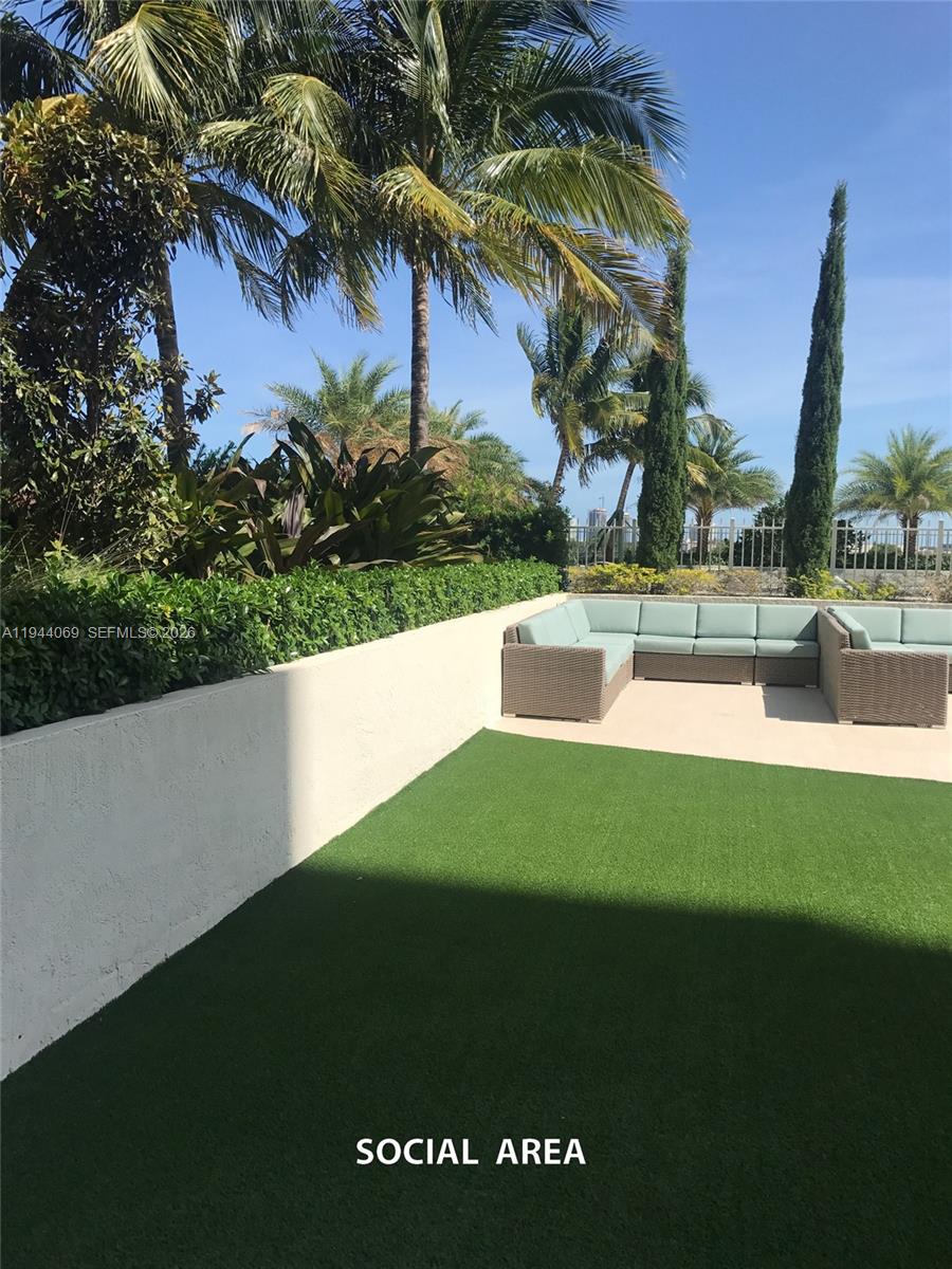 3000 Coral Way, Unit 1101 Miami, FL 33145 - Photo 11 of 16 a view of a house with a yard