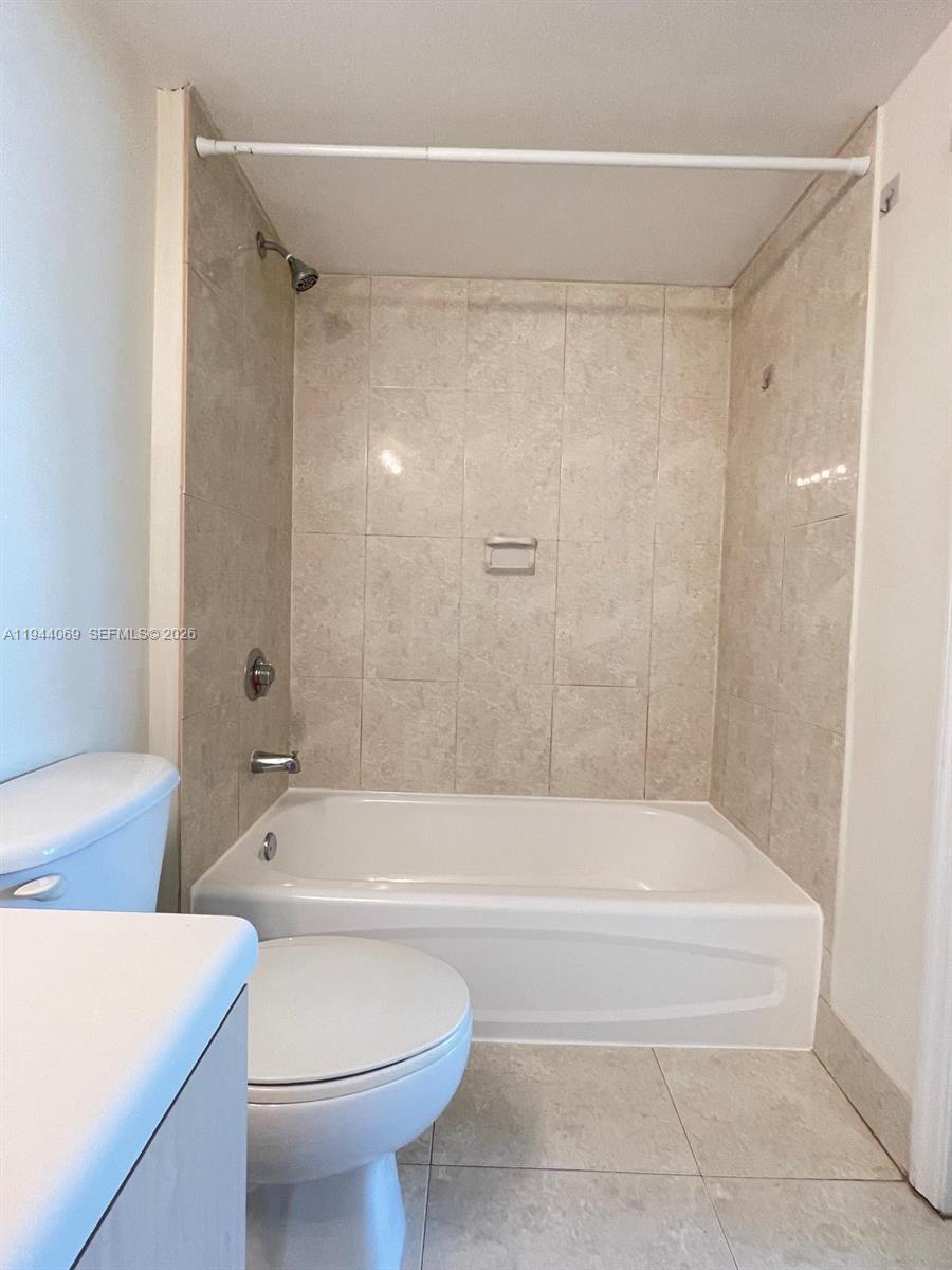 3000 Coral Way, Unit 1101 Miami, FL 33145 - Photo 4 of 16 a bathroom with a bathtub and a shower