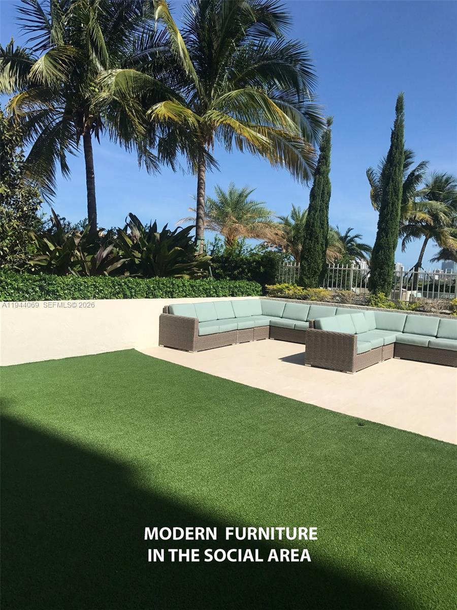 3000 Coral Way, Unit 1101 Miami, FL 33145 - Photo 8 of 16 a view of a swimming pool with a yard