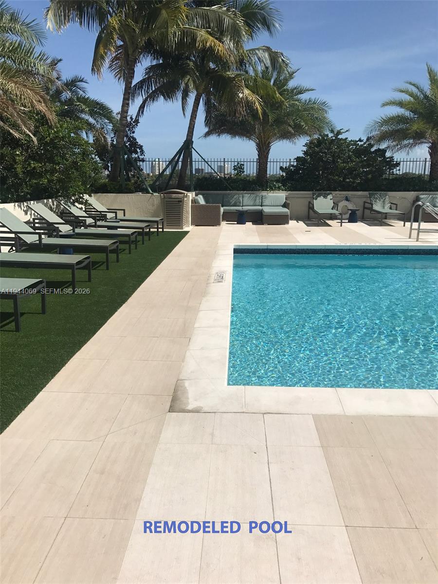 3000 Coral Way, Unit 1101 Miami, FL 33145 - Photo 10 of 16 a view of swimming pool with outdoor seating
