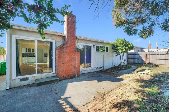 a backyard of a house with lots of green space