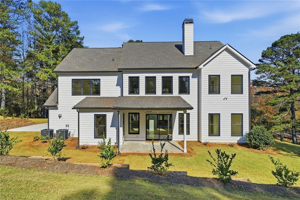 420 Stock Gap Road Southwest Monroe, GA 30656 - Photo 48 of 50 a front view of a house with swimming pool